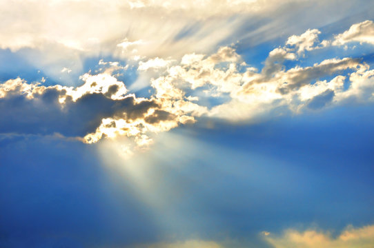 Sky with clouds and sun rays