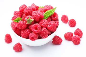 Crockery with  beautiful tempting raspberries.