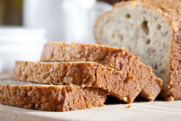 Delicious freshly baked banana bread on wooden board
