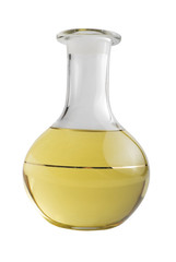 Yellow liquid in glass decanter | Isolated