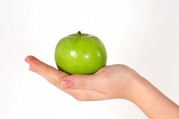 Hand mit grünem Apfel
