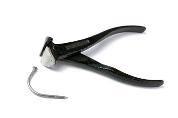 pliers and nail