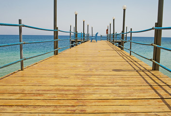 Fototapeta premium Wooden jetty on a tropical beach