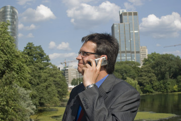 Businessman alking on cell phone