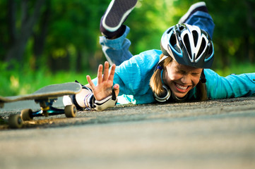Teenage girl with skateboard