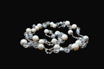 Necklace on black background