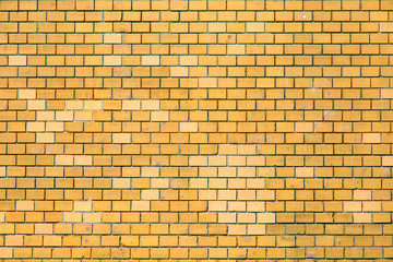 An ochre brick wall
