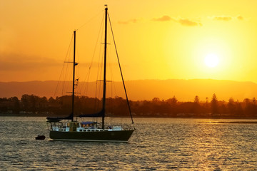 Yacht At Sunset