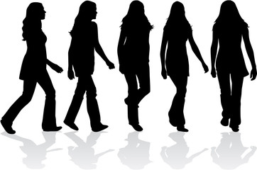 Obraz premium silhouettes of women reaching