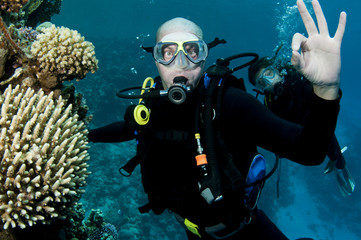 male scuba diver ,OK sighn