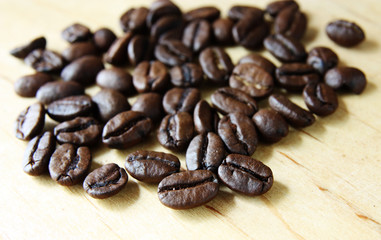 coffee beans on wooden board