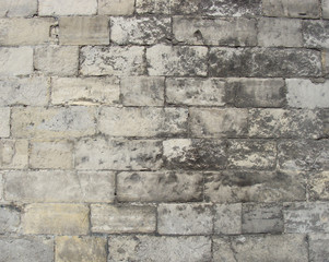 very old worn wall with large stones