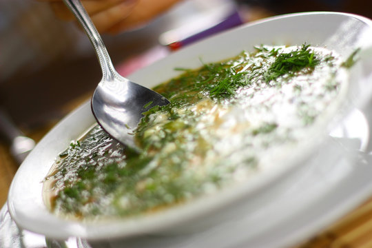 Soupe with aneth, sour creme and vegetables.