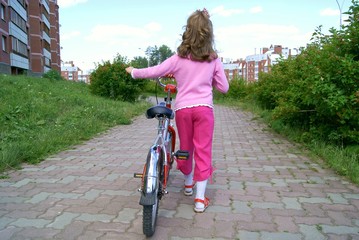 The girl with a bicycle