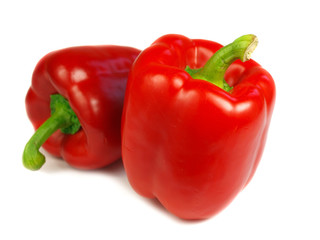 Red peppers on white background