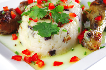 chicken drumsticks served on white