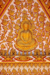 Fototapeta premium art on gable of temple, Wat Wang Pla Do, Borabue, Mahasarakam