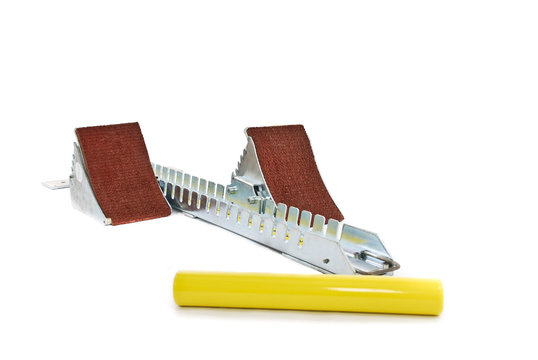 Starting block and baton