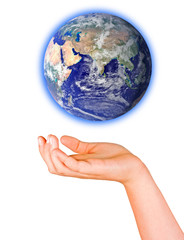 Hand with planet earth