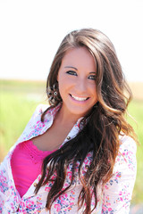 Fototapeta premium outdoor portrait young smiling teen girl pink top