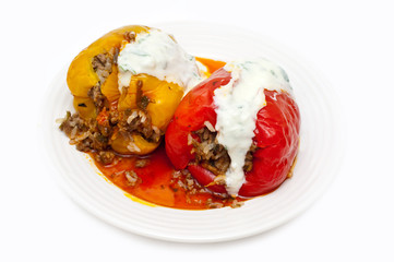 yellow and red stuffed peppers isolated