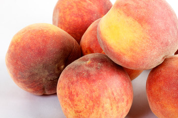 Fresh peaches - isolated on white