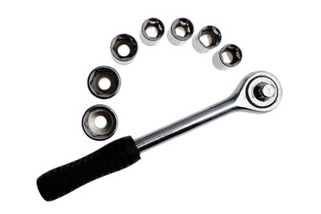 Ratchet with seven nuts. Isolated on white background