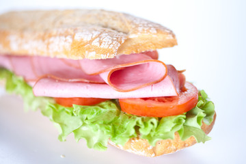 sandwich of ham lettuce and tomato