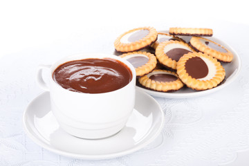 Cup of hot chocolate and pastry