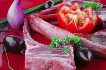 image of ribs served on red