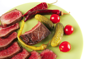 meat and vegetables with peppers