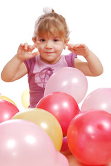 Fototapeta na wymiar little girl with colorful balloons