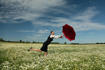 Insurance Agent protects you. Businesswoman with Red Umbrella - Powered by Adobe