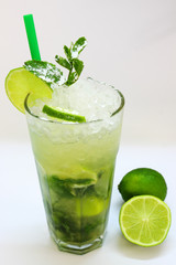 mixed alcoholic drink - isolated mojito with lime and mint