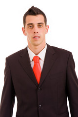 Young business man portrait, standing looking at the camera