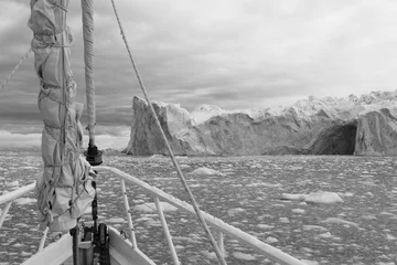 Foto op Canvas BW Sailing boat in Antarctic waters with majestic landscape © Achim Baqué