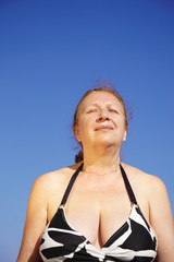 senior woman relax on the beach