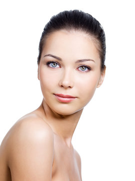 Young woman with beautiful face with healthy skin