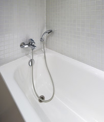 bath tub with shower attachment