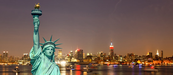 The Statue of Liberty and New York City skylines - 24144507