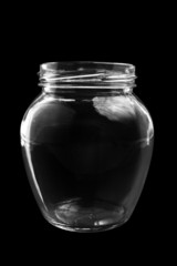 Glass bottle on black background (isolated, close up)