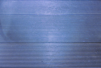 A striped silver bluish surface