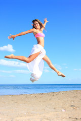 Beautiful woman by the sea