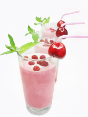 fruit cocktails with cherry and raspberry