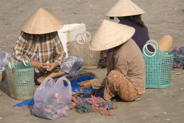 Vietnamese fishermen on the beach