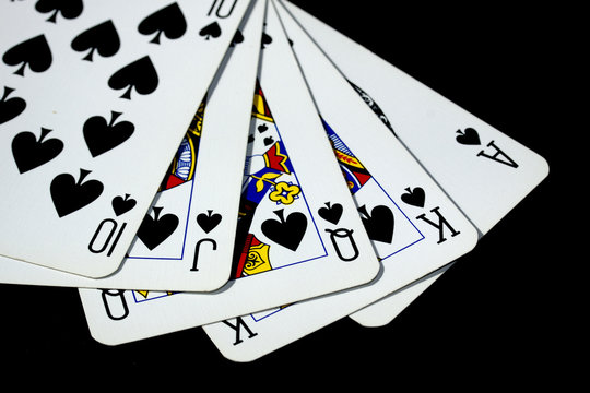 Poker Playing Cards on Black Background