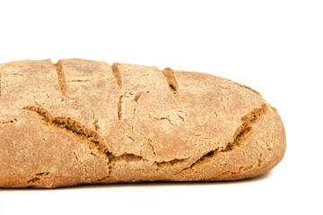 long loaf of hot whole rye kosher bread isolated on white