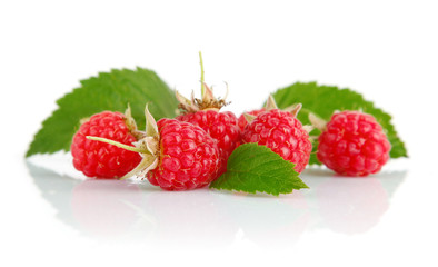 fresh raspberry fruits with green leaves
