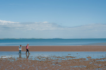 Fototapeta na wymiar Children on Beach