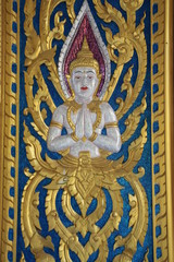 art carving on door of stupa, Wat Rahan, Ban Dan, Buriram
